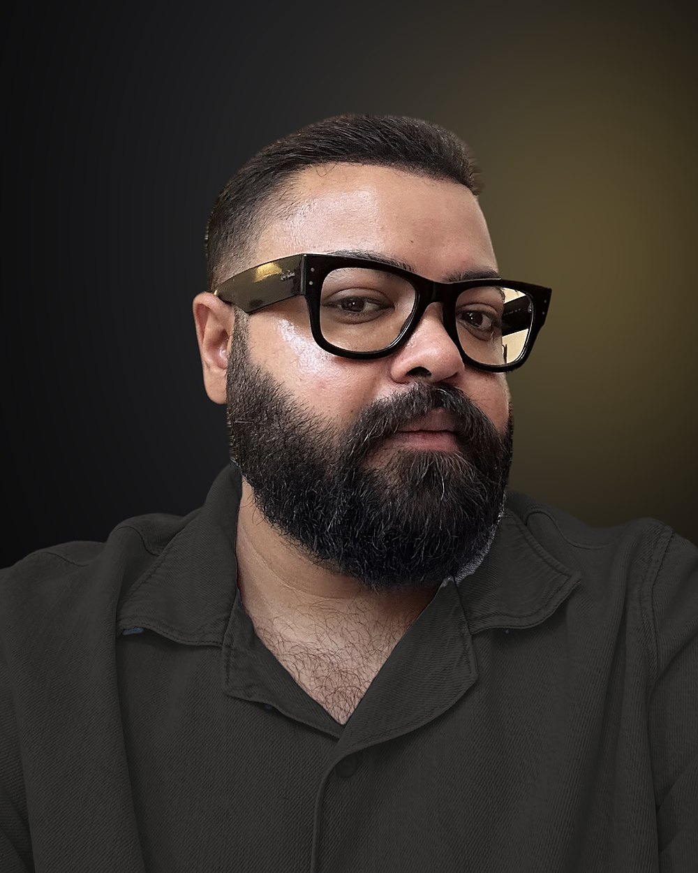 Devesh Maan, quantitative developer. A studio-graded portrait in the site's black and gold.